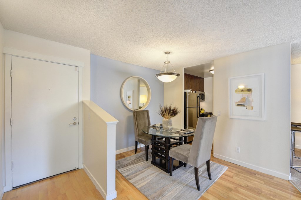 a dining room with a table and chairs at The Retreat at Walnut Creek, Walnut Creek, CA, 94596
