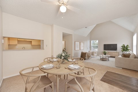 a dining room with a table and chairs at Vineyard Terrace Apartments, California, 94558