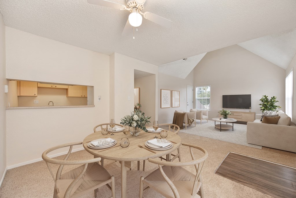 a dining room with a table and chairs a dining room with a table and chairs at Vineyard Terrace Apartments, California, 94558