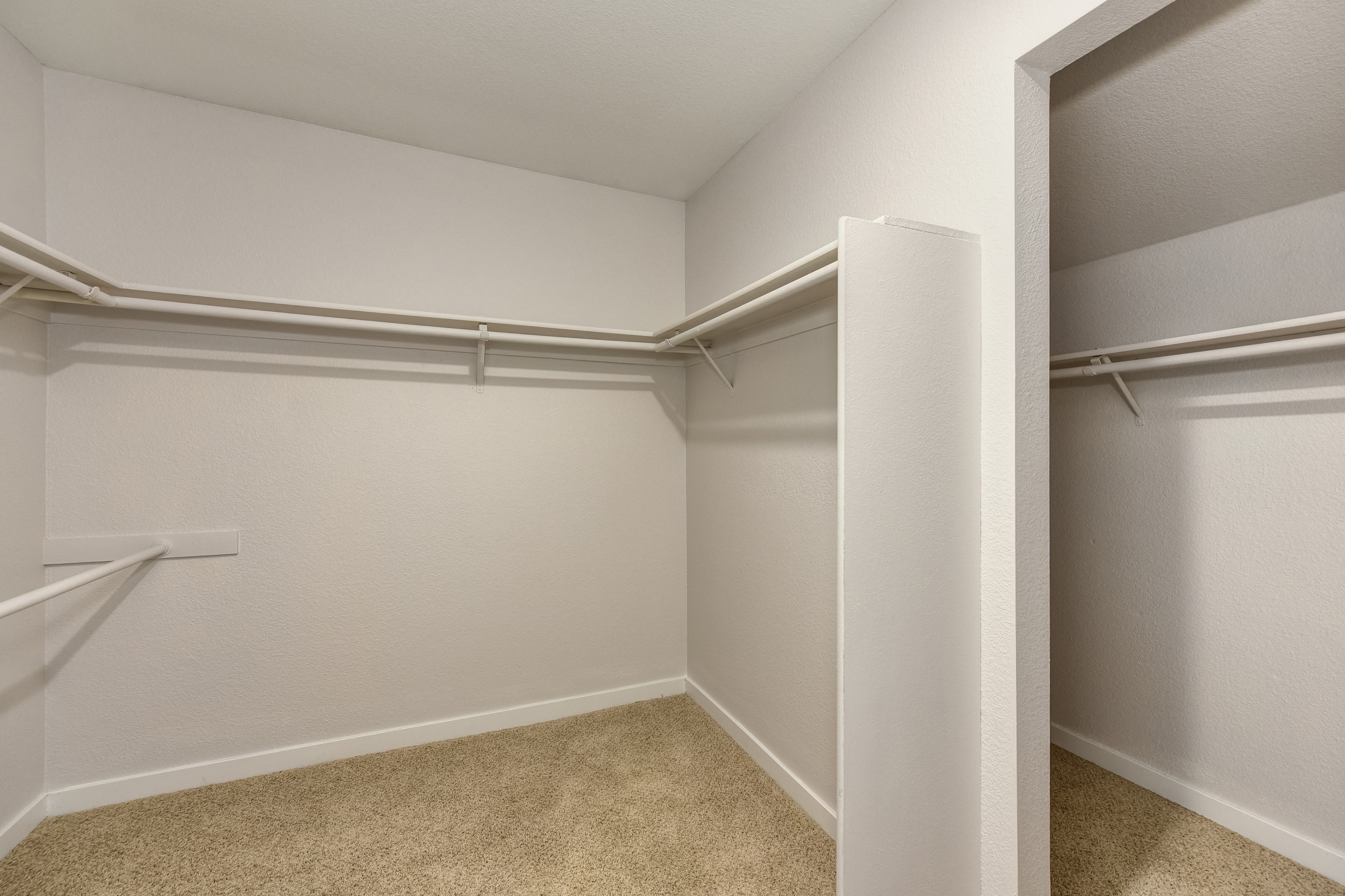 Walk In Closet in Bedroom, Shelves and Carpet at The Legacy Apartments, Antelope, California