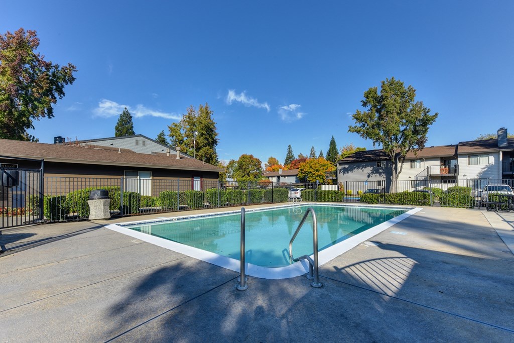 Ashford Heights pool and spa area  with black fence around.