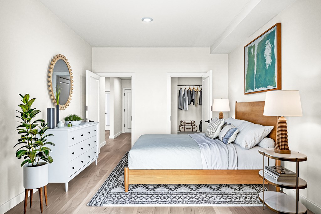 a bedroom with a bed and a dresser at Canyon Terrace Apartments, California, 95630