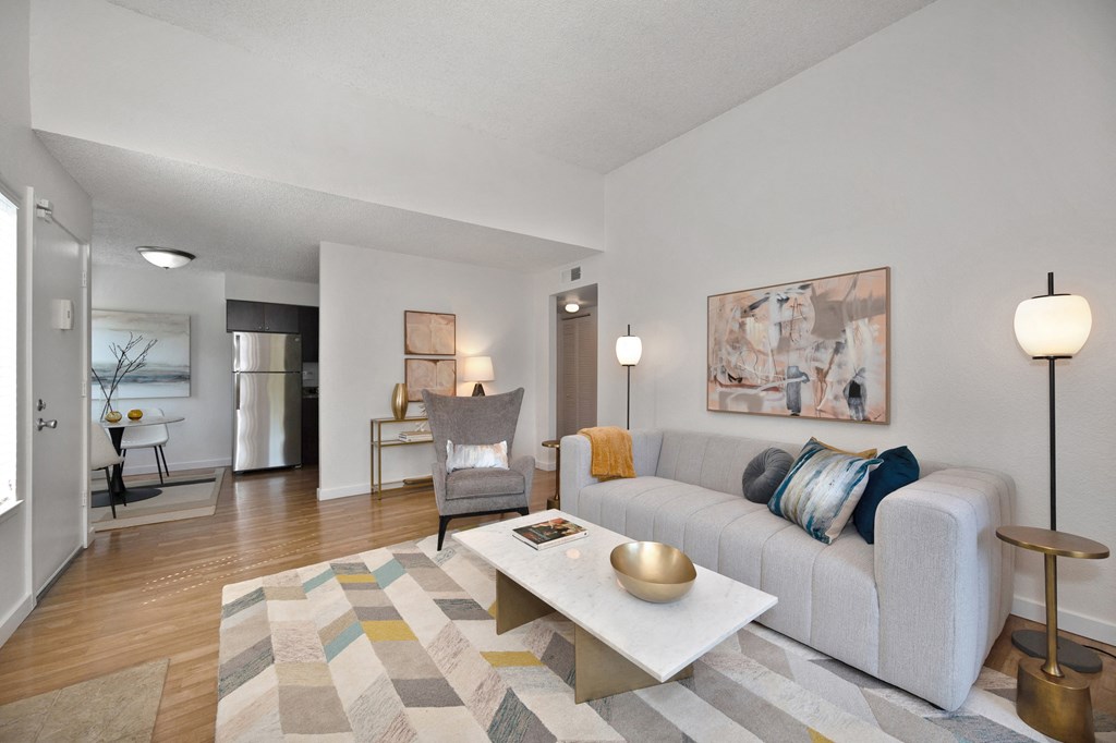 a living room with a couch coffee table and a chair at Fountains of Fair Oaks, Fair Oaks, CA 95628