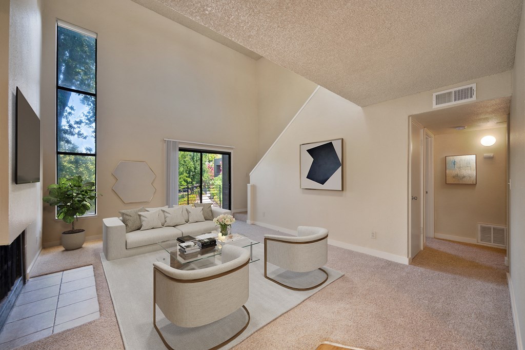 a living room with two couches and a coffee table at Fountains of Fair Oaks, California