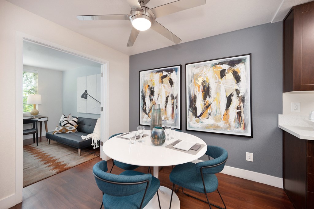 an open living room and dining room with a table and chairs at Folsom Ranch, Folsom