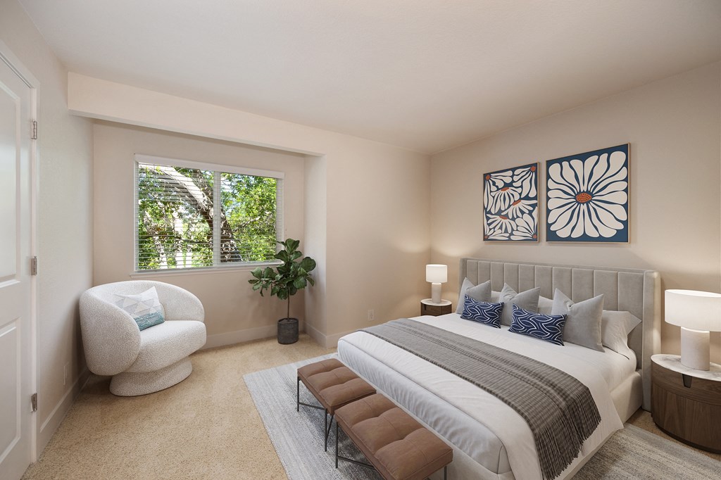 a bedroom with a bed and a chair and a window at Folsom Ranch, Folsom, CA