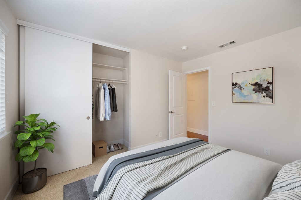 a bedroom with a bed and a closet at Folsom Ranch, Folsom, 95630