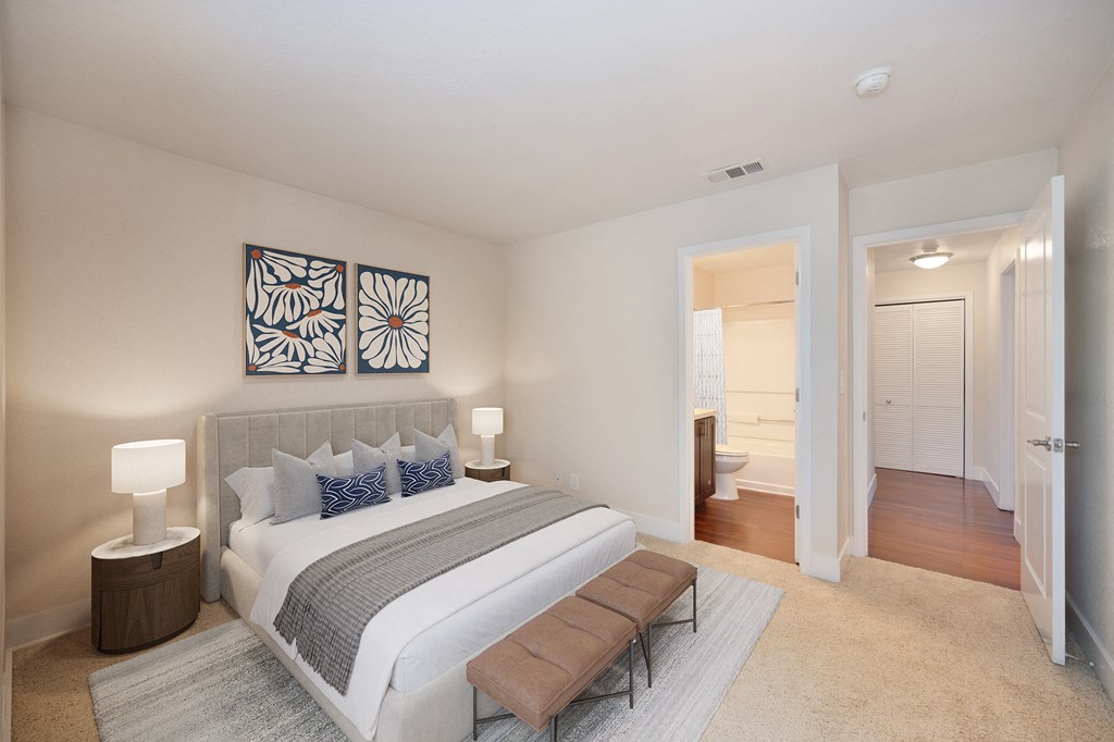 a master bedroom with a large bed and a bathroom at Folsom Ranch, Folsom, 95630