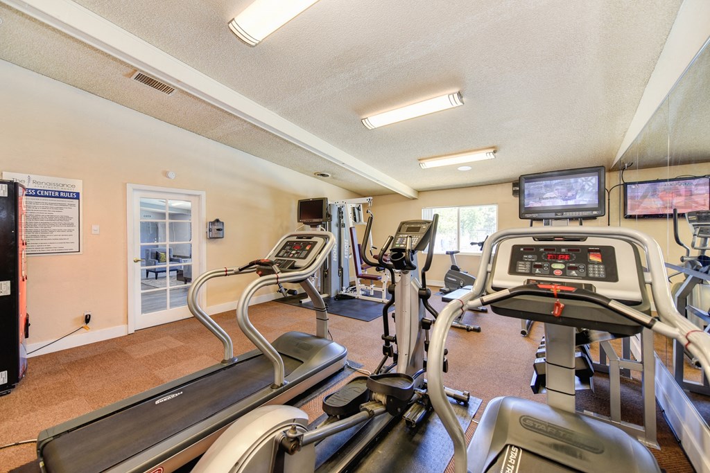 Fitness Center with Treadmills, Tv and Vending Machine.at The Renaissance Apartments, Citrus Heights, CA 95610