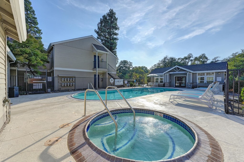 our apartments have a resort style pool with a hot tub at Hidden Oaks Apartments, Citrus Heights, California