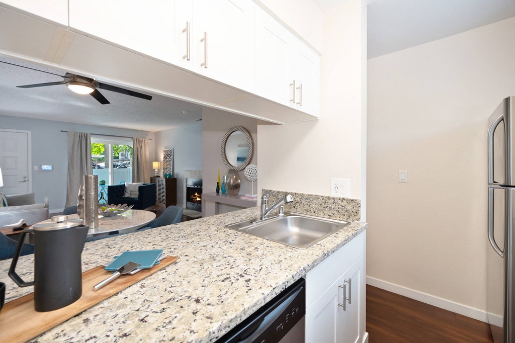 Granite Counter Tops In Kitchen at Hidden Oaks Apartments, Citrus Heights, California