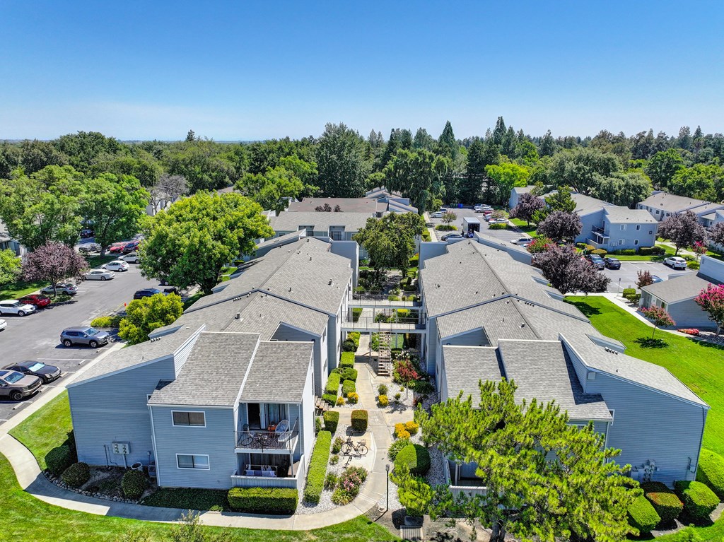 a aerial view of several houses in a neighborhood with trees at Silverstone Apartments, Davis, CA, 95618
