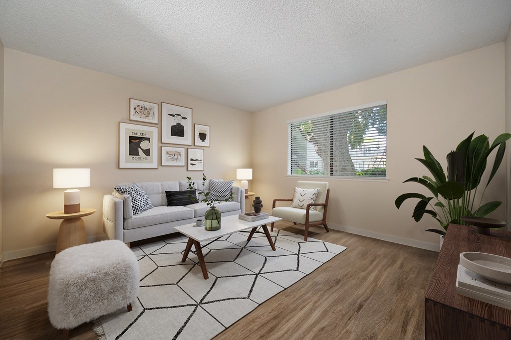 our apartments offer a living room with a couch and a coffee table at Silverstone Apartments, California