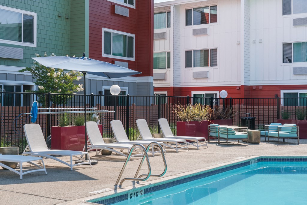 our apartments have a pool and lounge chairs
