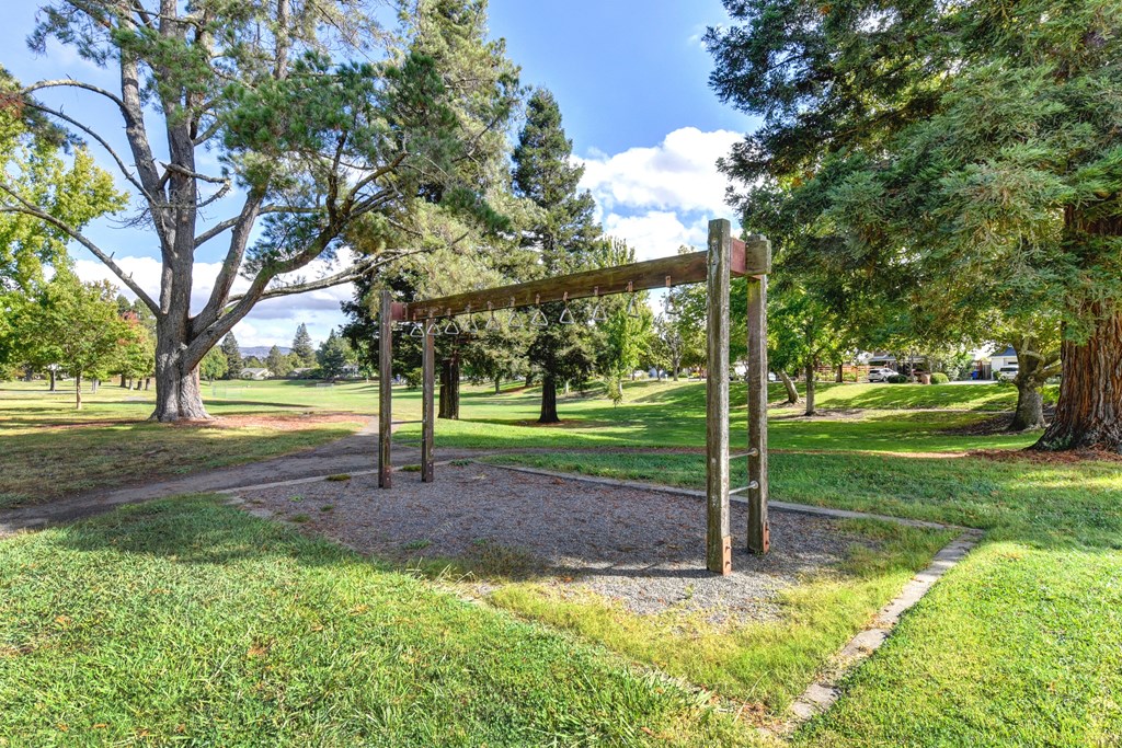 Nearby neighborhood park with monkey bars at Vineyard Terrace Apartments, Napa, CA