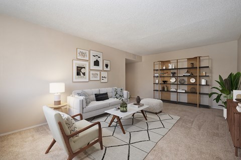 an open living room with a couch and a table