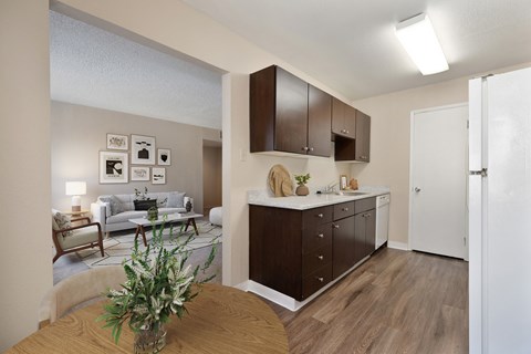our apartments offer a kitchen and living room with a table