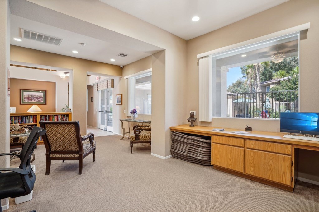 a office with a desk and a window