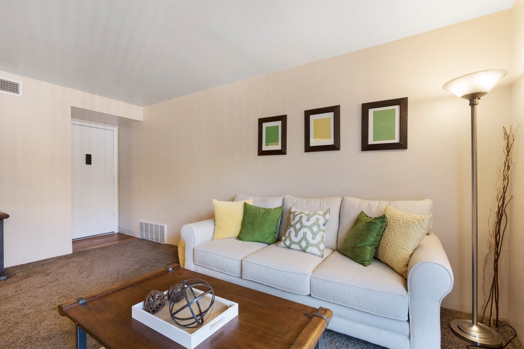 a living room with a couch and a coffee table