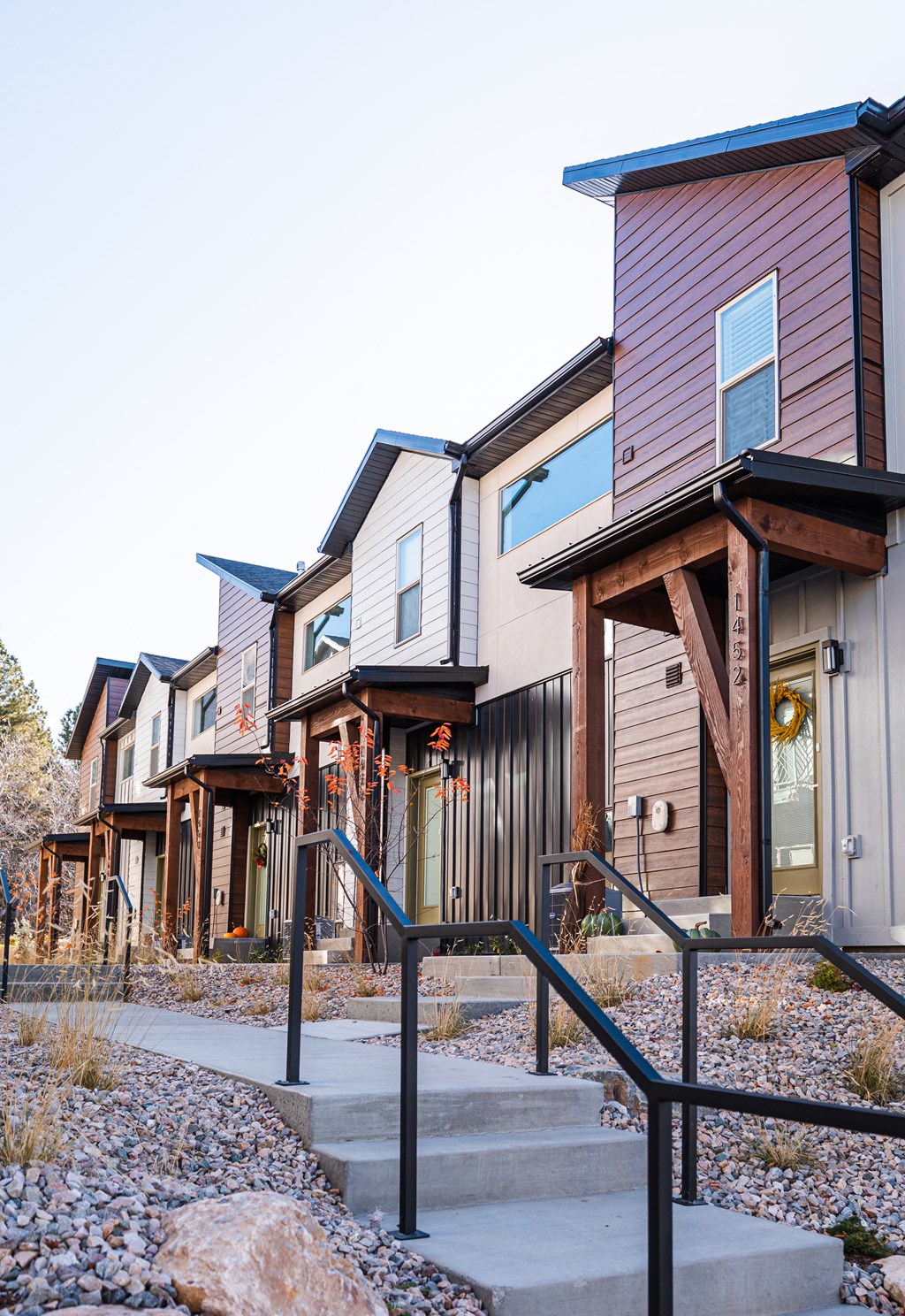 a row of houses on a hillside