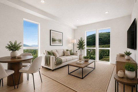 A modern living room with a view of the mountains.