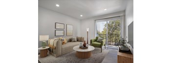 A living room with a couch, a chair, a table, and a lamp.