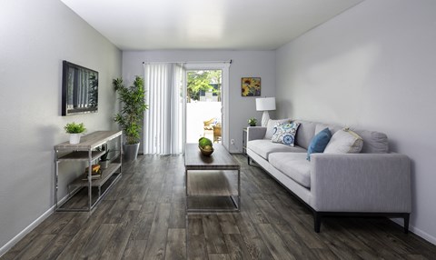 a living room with a couch and a coffee table