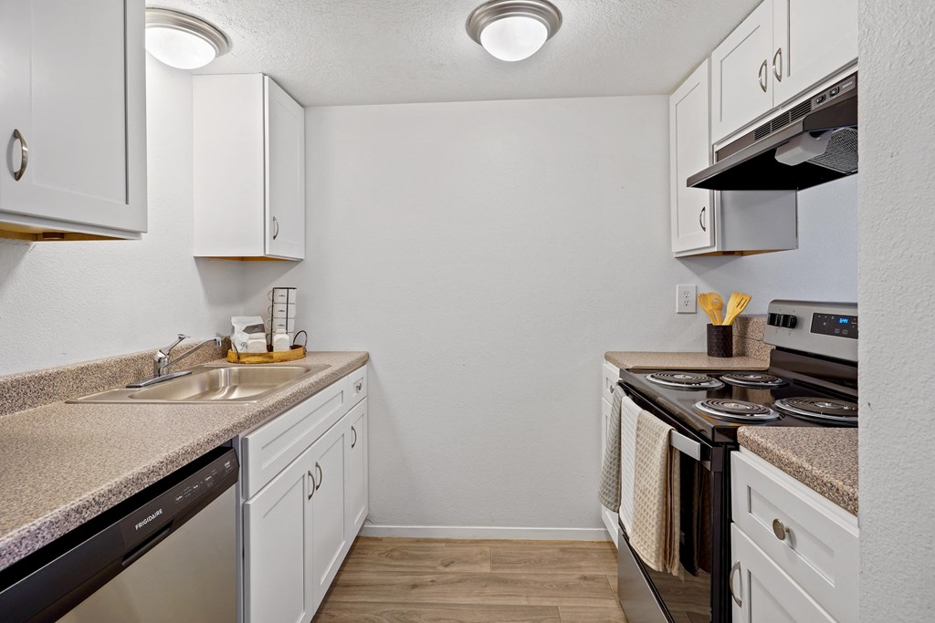 the preserve at ballantyne commons apartment kitchen with stainless steel appliances