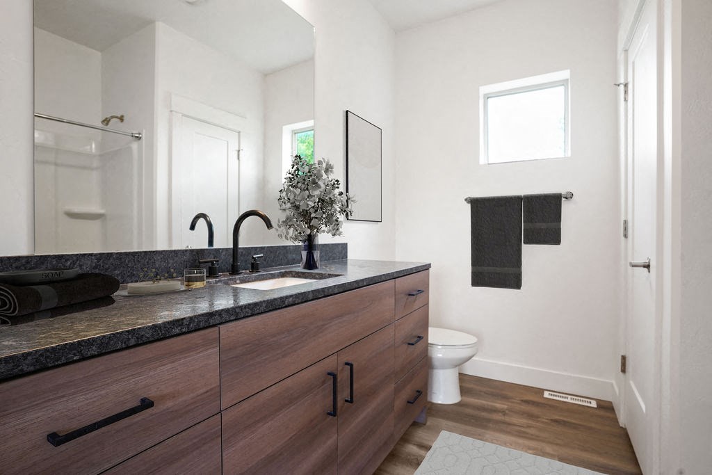 a bathroom with a sink and a toilet
