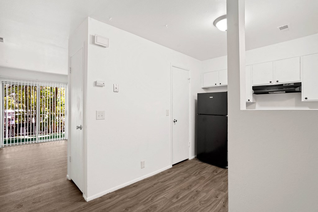 a kitchen and living room in a 555 waverly unit