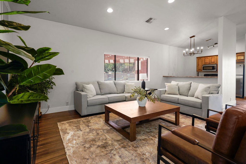 a living room with couches and a table