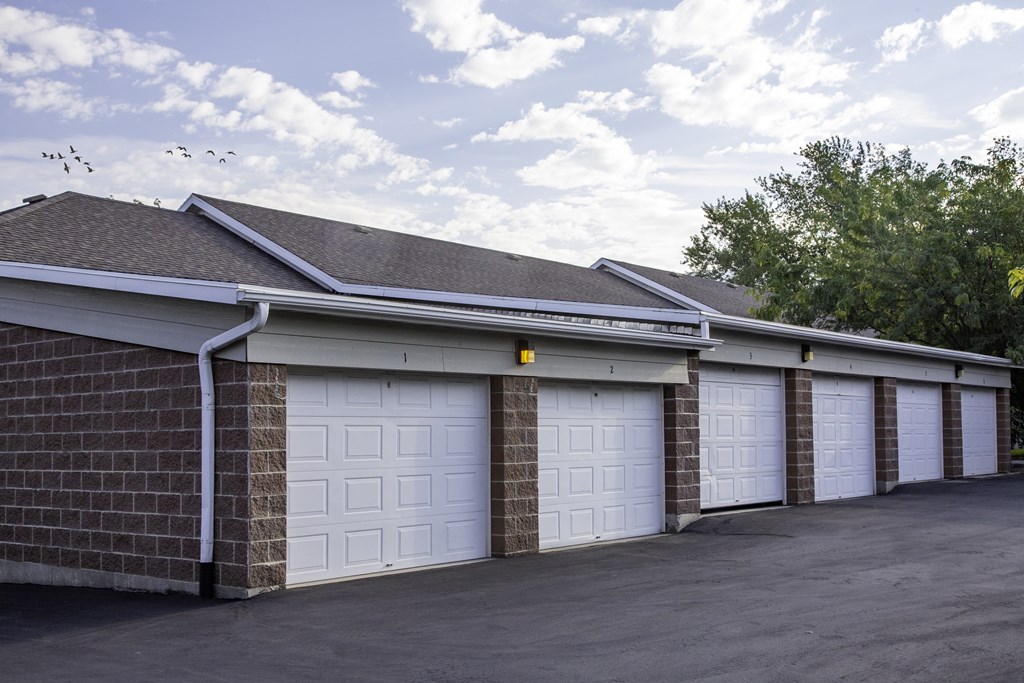 A row of garage doors are closed.
