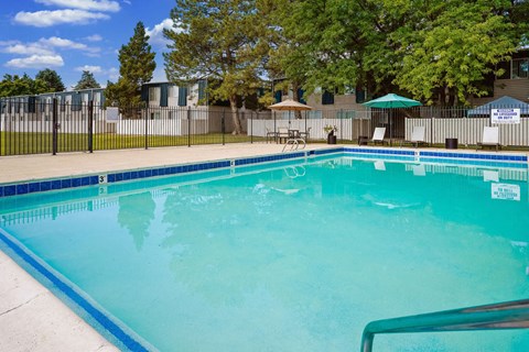 the swimming pool at our apartments with a resort style pool
