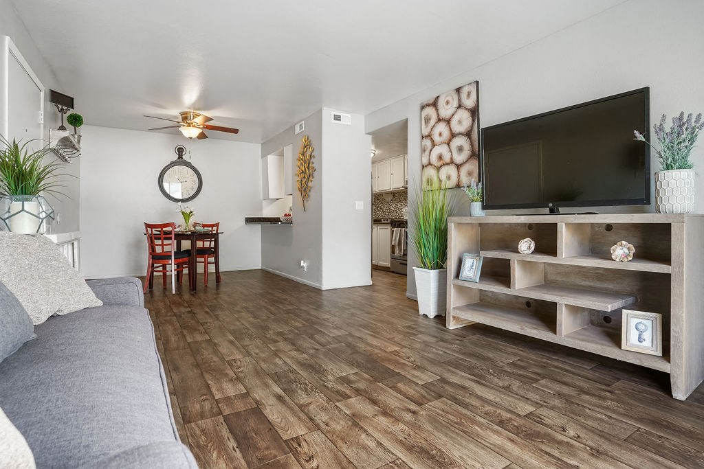 a living room with a couch and a tv