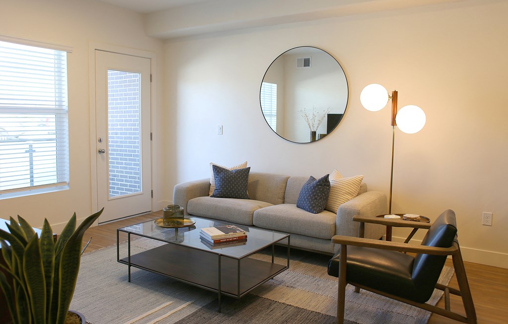 a living room with a couch and a coffee table