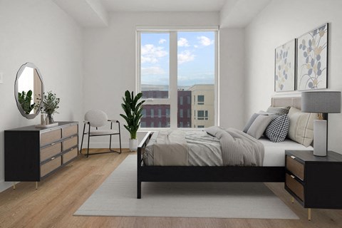 a living room with a bed and a window at SPARK Apartments, Salt Lake CIty, UT, 84116