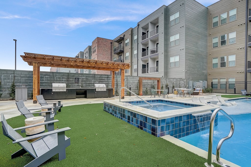 our apartments have a large pool and lounge area with chairs