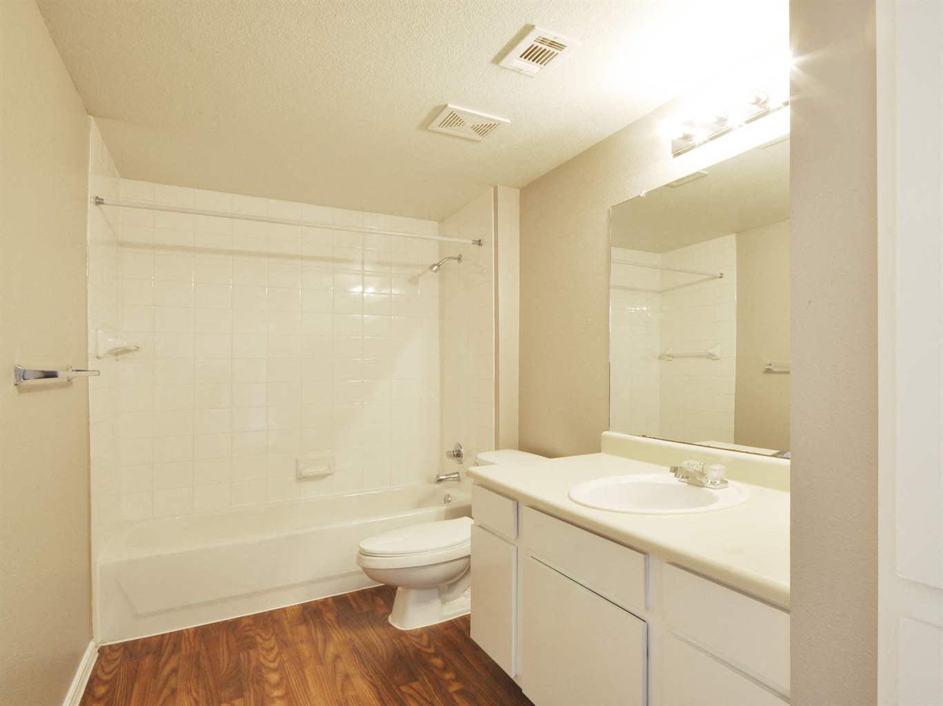 Wood Style Flooring in Bathroom at Stoneleigh on Cartwright Apartments, J Street Property Services, Mesquite