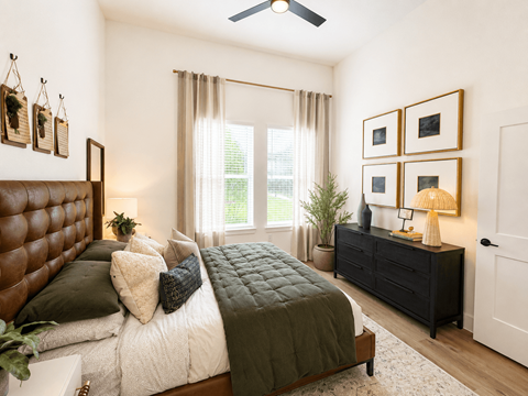 Spacious primary bedroom with natural light at The Bluewood