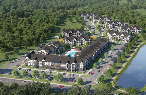 A bird's eye view of a residential complex with a swimming pool.