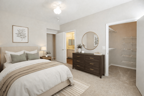 Spacious bedroom with walk-in closet and ensuite at Stoneleigh on Cartwright Apartments, Balch Springs, TX
