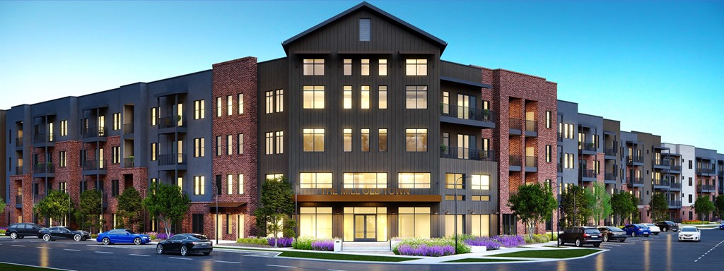 a rendering of a large apartment building with cars parked in front of it at The Mill Old Town, Lewisville, 75057