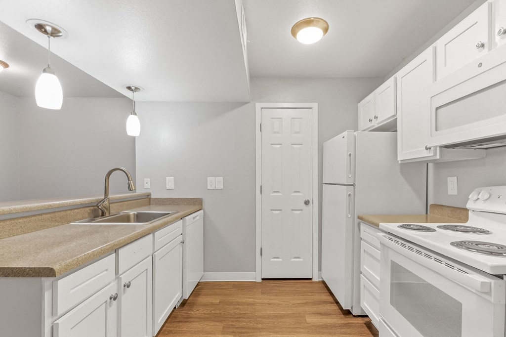 A Kitchen at The Buttes Apartments, Loveland, 80537