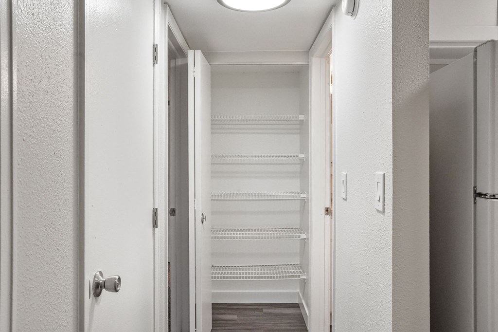 A typical linen closet at Horizon East Apartments in Aurora, Colorado