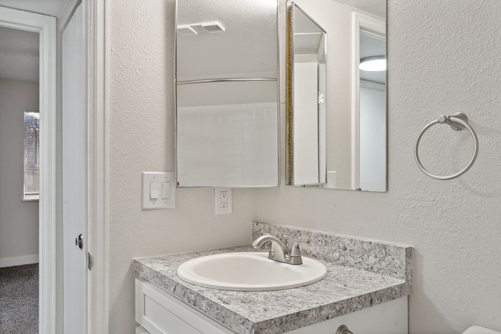Our Renovated Apartment Bathrooms at Horizon East Apartments in Aurora, Colorado