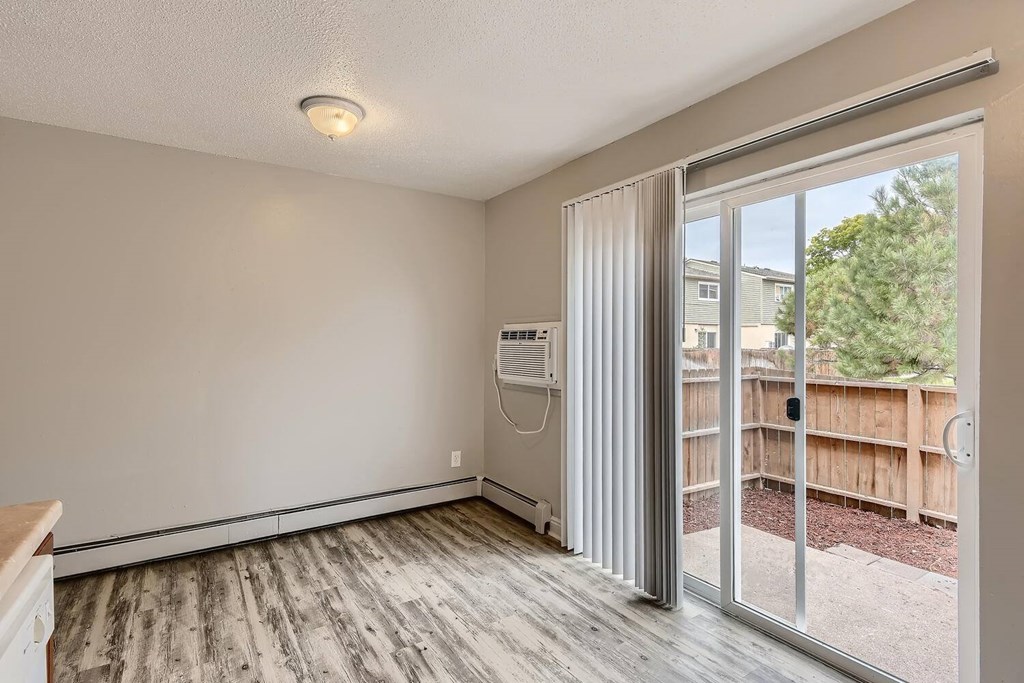 A Dining Room with Air Conditioning at Alder Square Rental Townhomes