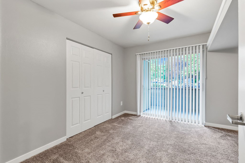 A Bedroom at The Buttes Apartments, Colorado