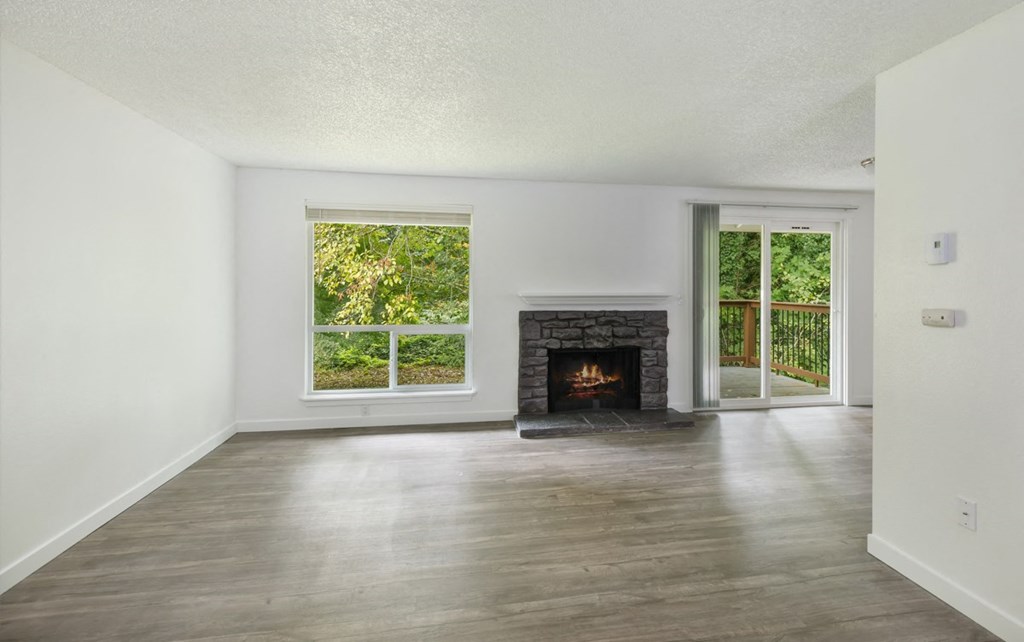Interior Living Room with Fireplace at Wilderness West Apartments in Olympia, Washington
