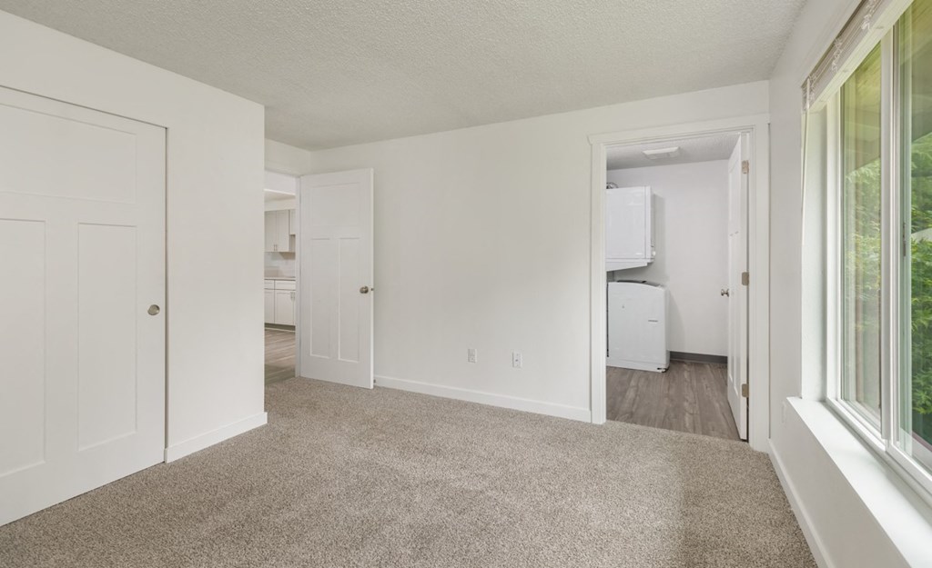 Our Apartment Bedroom with Laundry Room at Wilderness West Apartments in Olympia, Washington