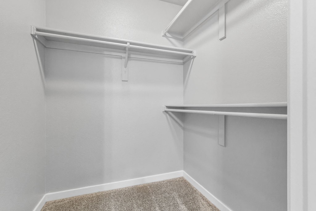 A spacious walk-in Closet at The Buttes Apartments, Colorado